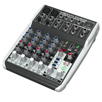 The Behringer Premium 6-Input 2-Bus XENYX QX602MP3 Mixer With Mic Preamp
